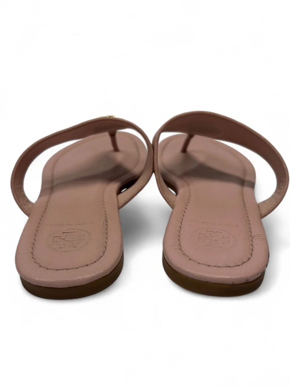 the Tory Burch Jolie Flat Thong Sandals in Sea Shell Pink tumbled leather. 6.5